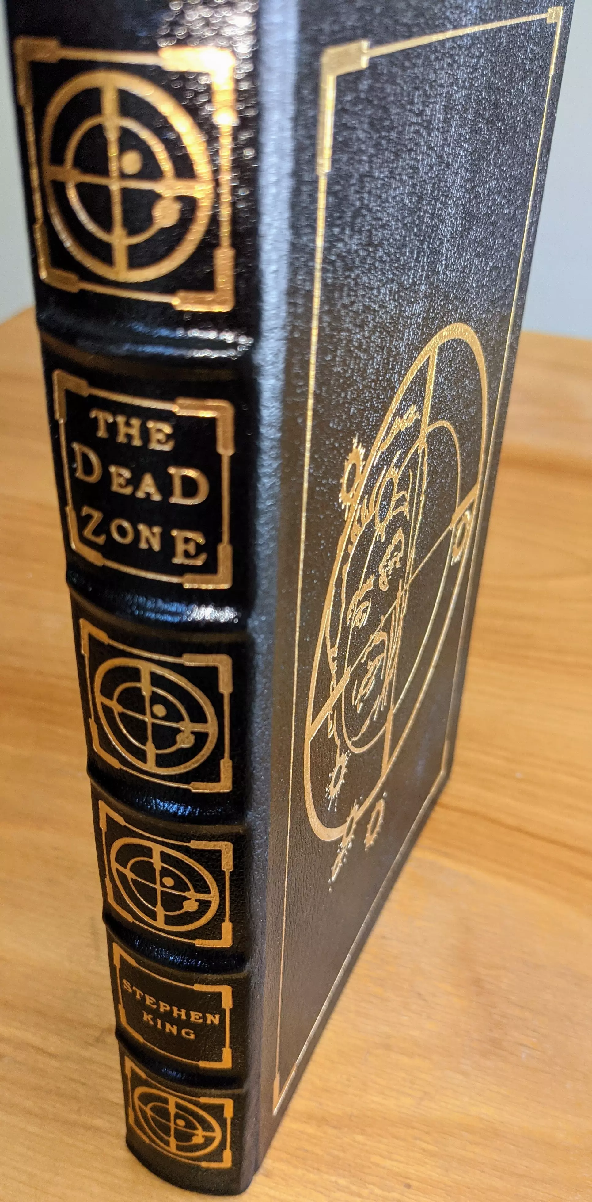 Stunning Black Leather Bound hardback book with hubbed spine, cover artwork in 22kt gold, printed on archival paper with gold gilded edges, smyth sewing & concealed muslin joints
	  - original artwork by Jill Bauman