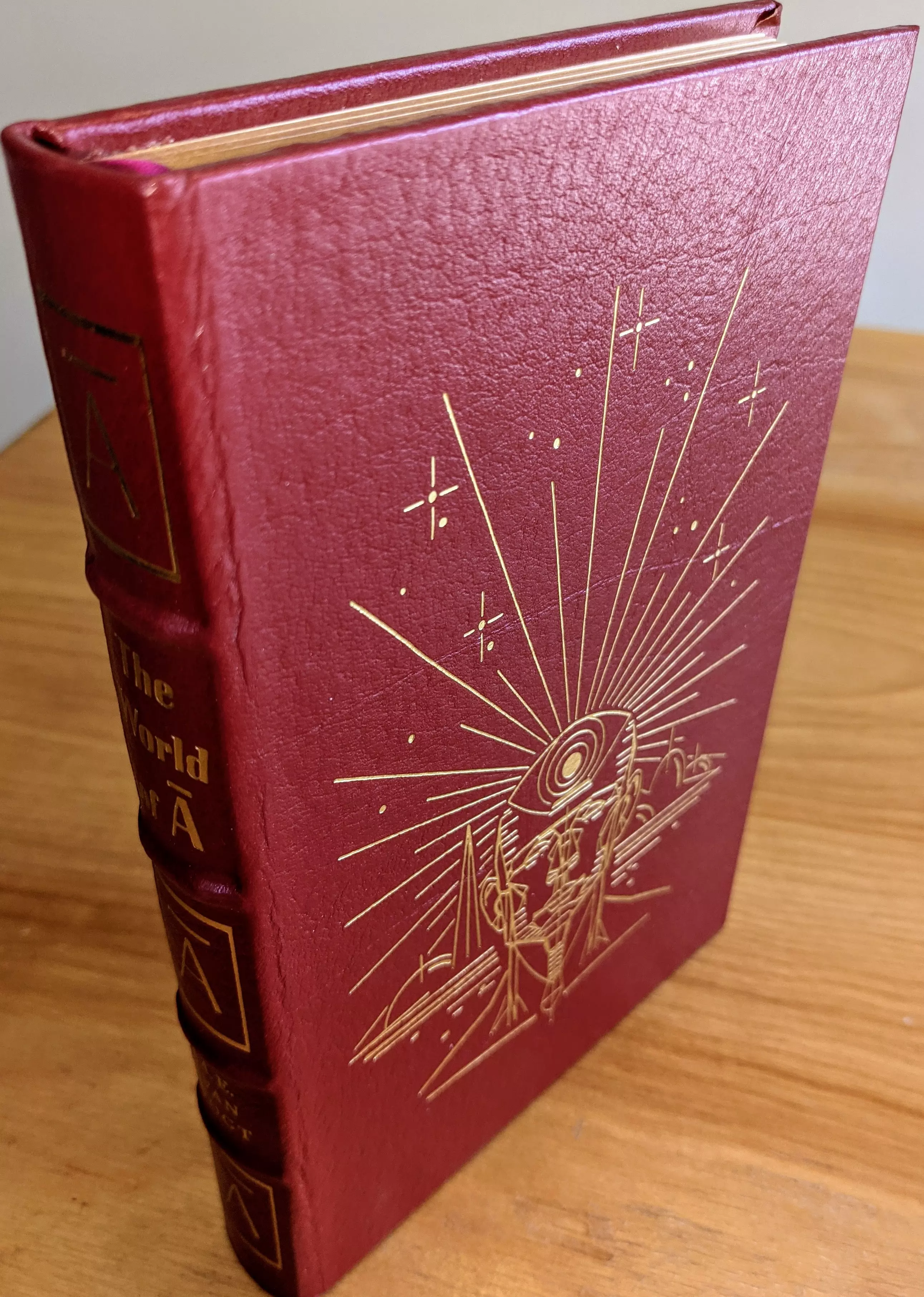 Stunning Red Leather Bound hardback book with hubbed spine, cover artwork in 22kt gold, printed on archival paper with gold gilded edges, smyth sewing & concealed muslin joints
	  - original artwork by Vincent Difate