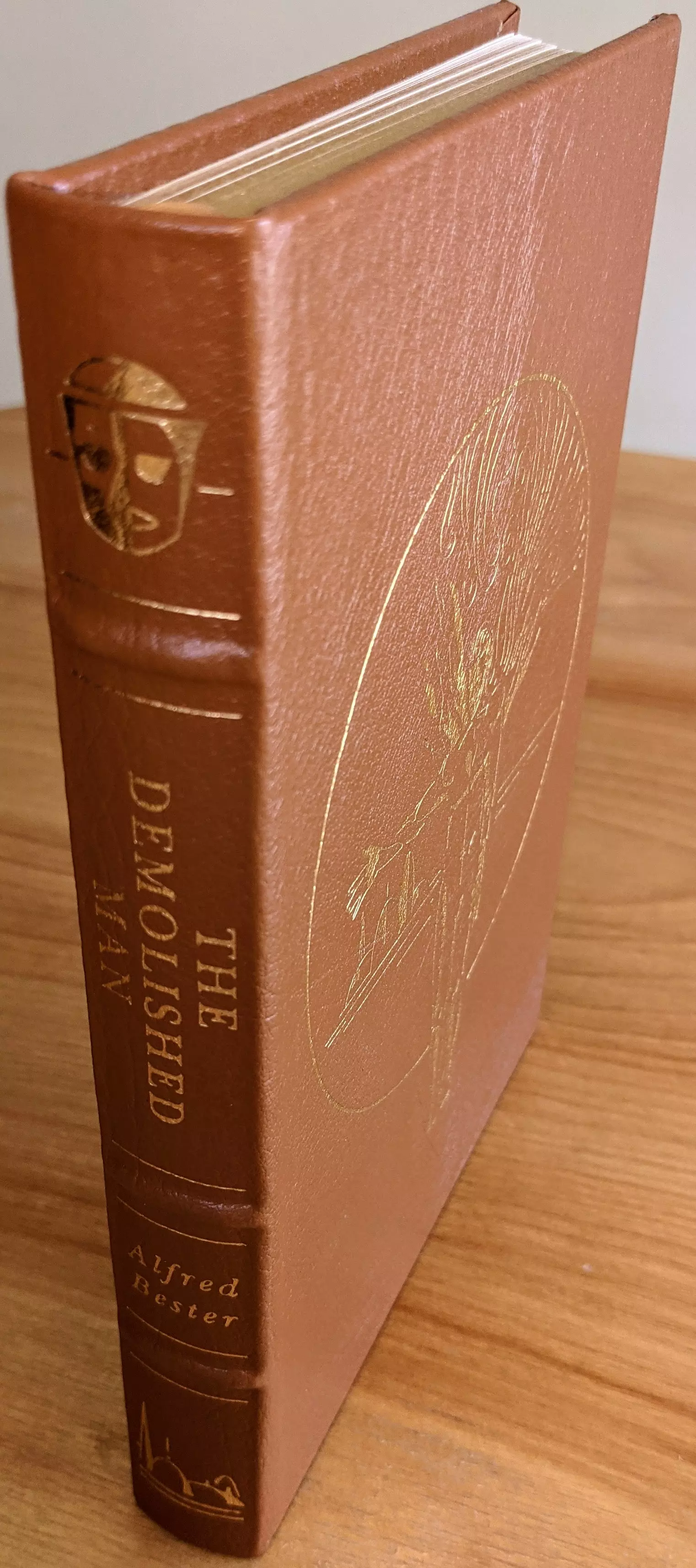 Stunning Brown Leather Bound hardback book with hubbed spine, cover artwork in 22kt gold, printed on archival paper with gold gilded edges, smyth sewing & concealed muslin joints
	  - original artwork by Vincent Difate