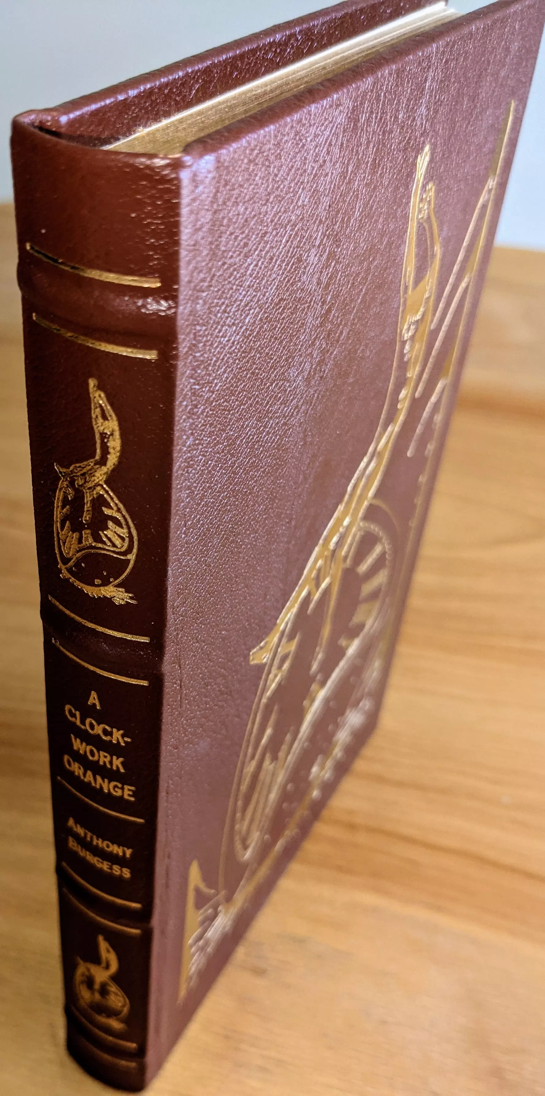 Stunning Brown Leather Bound hardback book with hubbed spine, cover artwork in 22kt gold, printed on archival paper with gold gilded edges, smyth sewing & concealed muslin joints
	  - original artwork by Ron Miller