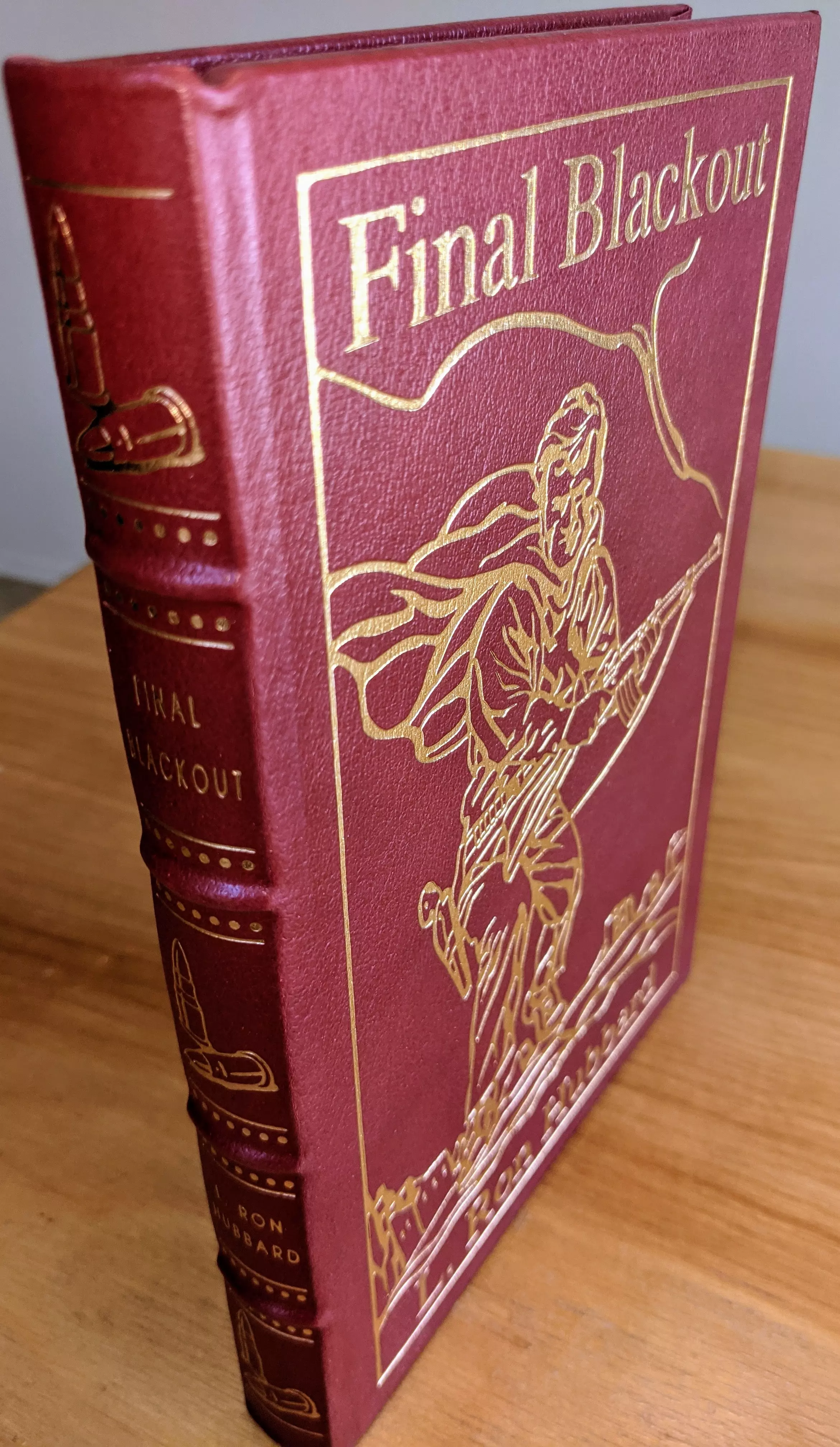 Stunning Red Leather Bound hardback book with hubbed spine, cover artwork in 22kt gold, printed on archival paper with gold gilded edges, smyth sewing & concealed muslin joints
	  - original artwork by L. Ron Hubbard Library