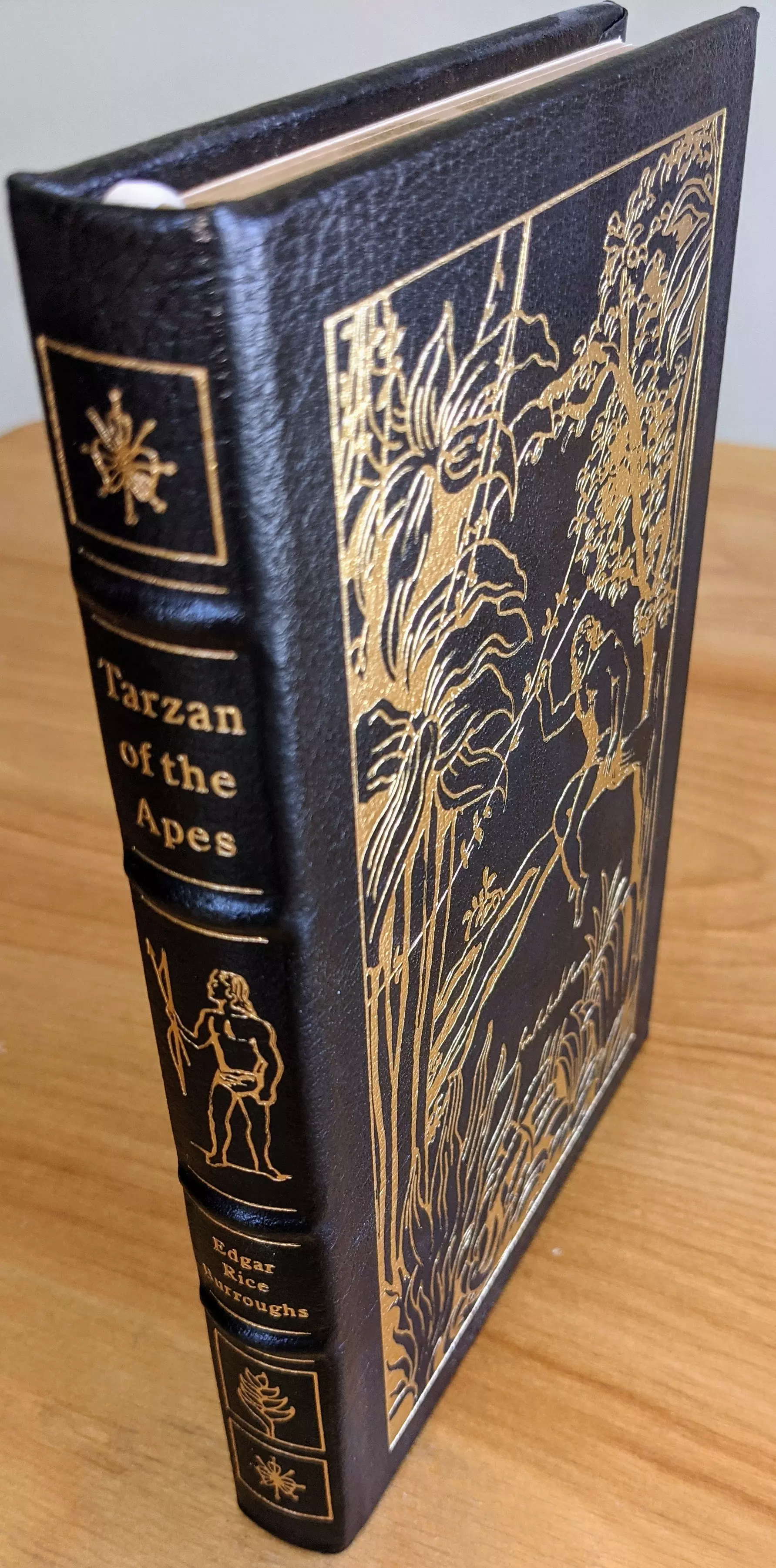 Stunning Black Leather Bound hardback book with hubbed spine, cover artwork in 22kt gold, printed on archival paper with gold gilded edges, smyth sewing & concealed muslin joints
	  - original artwork by Kent Bash