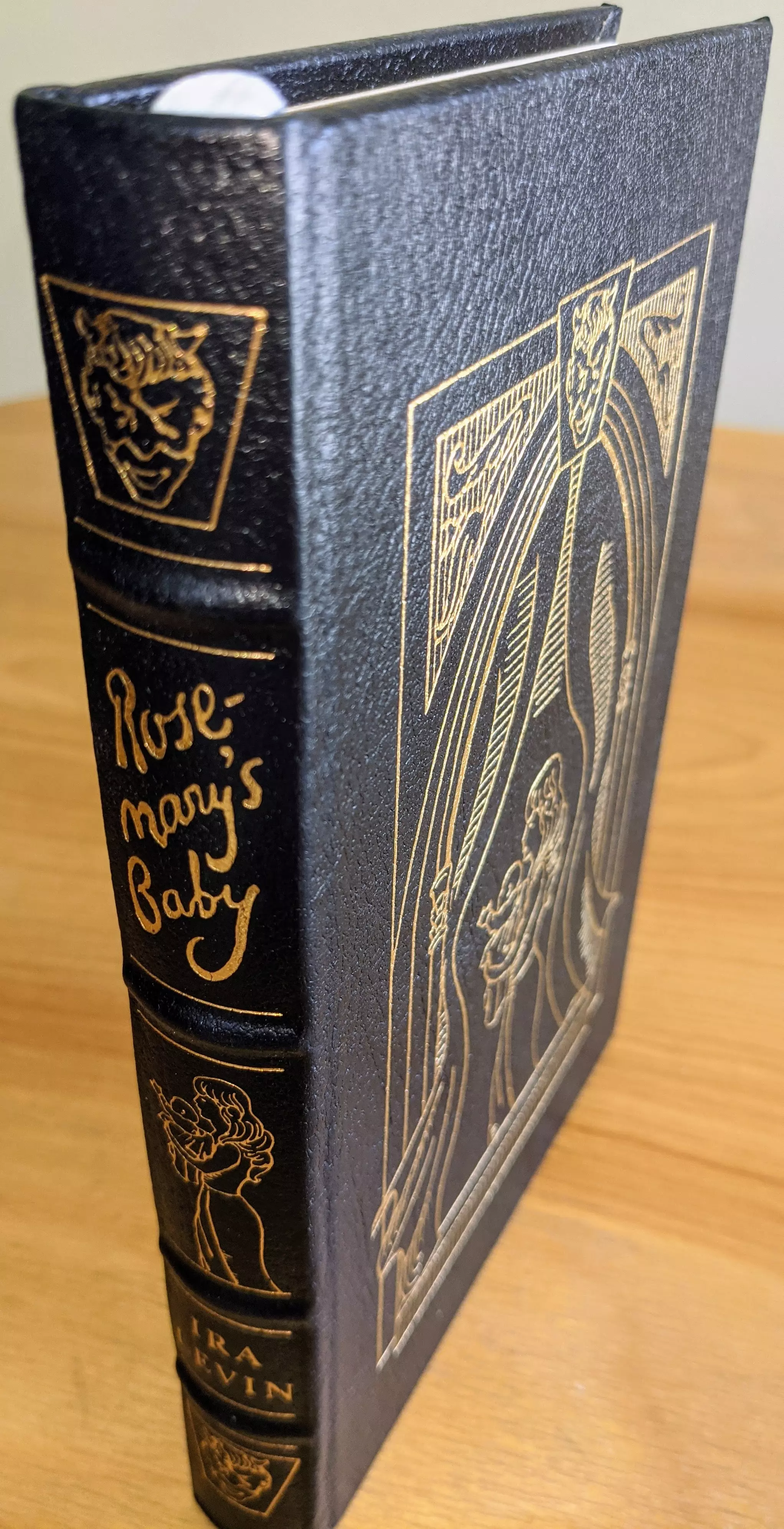 Stunning Black Leather Bound hardback book with hubbed spine, cover artwork in 22kt gold, printed on archival paper with gold gilded edges, smyth sewing & concealed muslin joints
	  - original artwork by Frank Kelly Freas