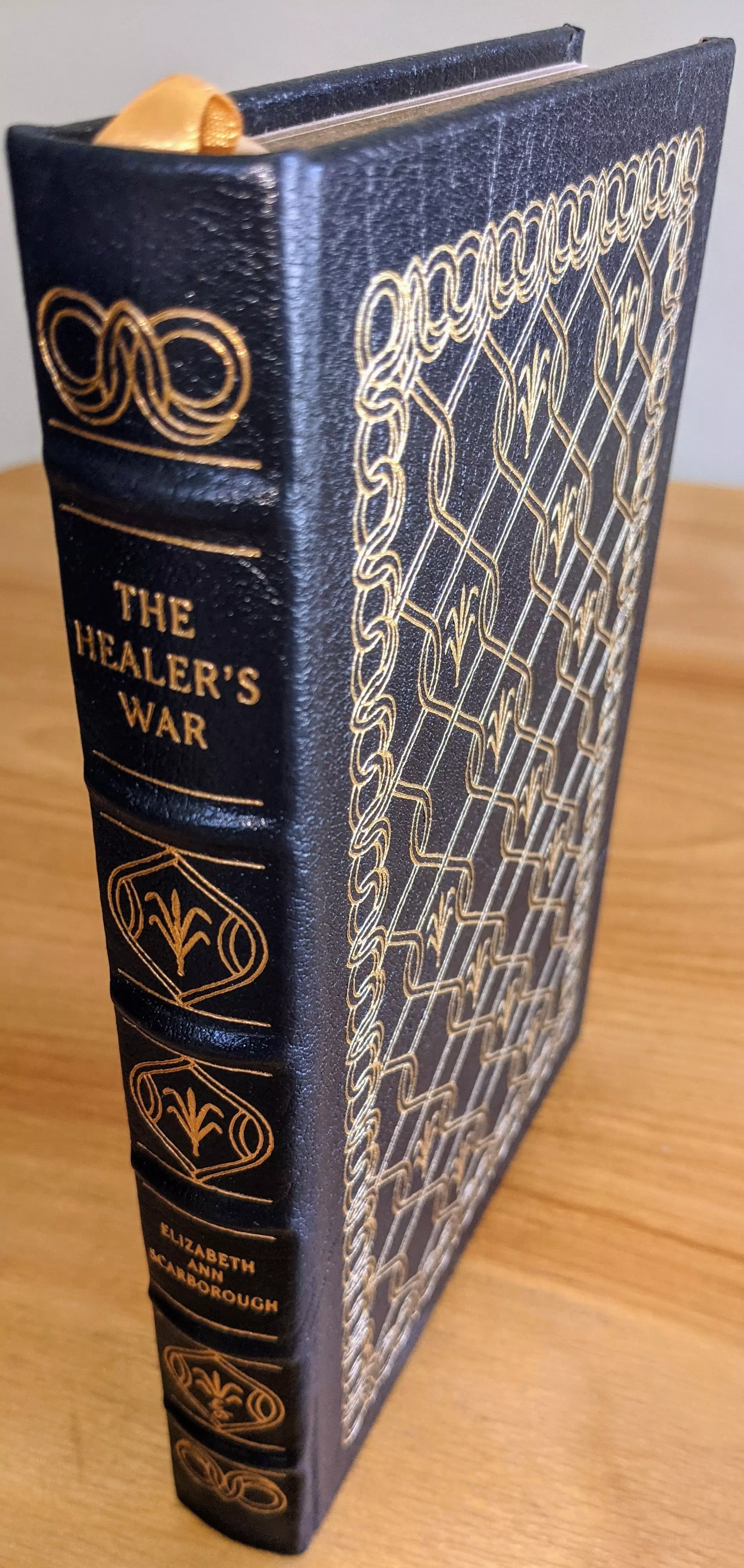Stunning Blue Leather Bound hardback book with hubbed spine, cover artwork in 22kt gold, printed on archival paper with gold gilded edges, smyth sewing & concealed muslin joints
	  - original artwork by Frank Kelly Freas
