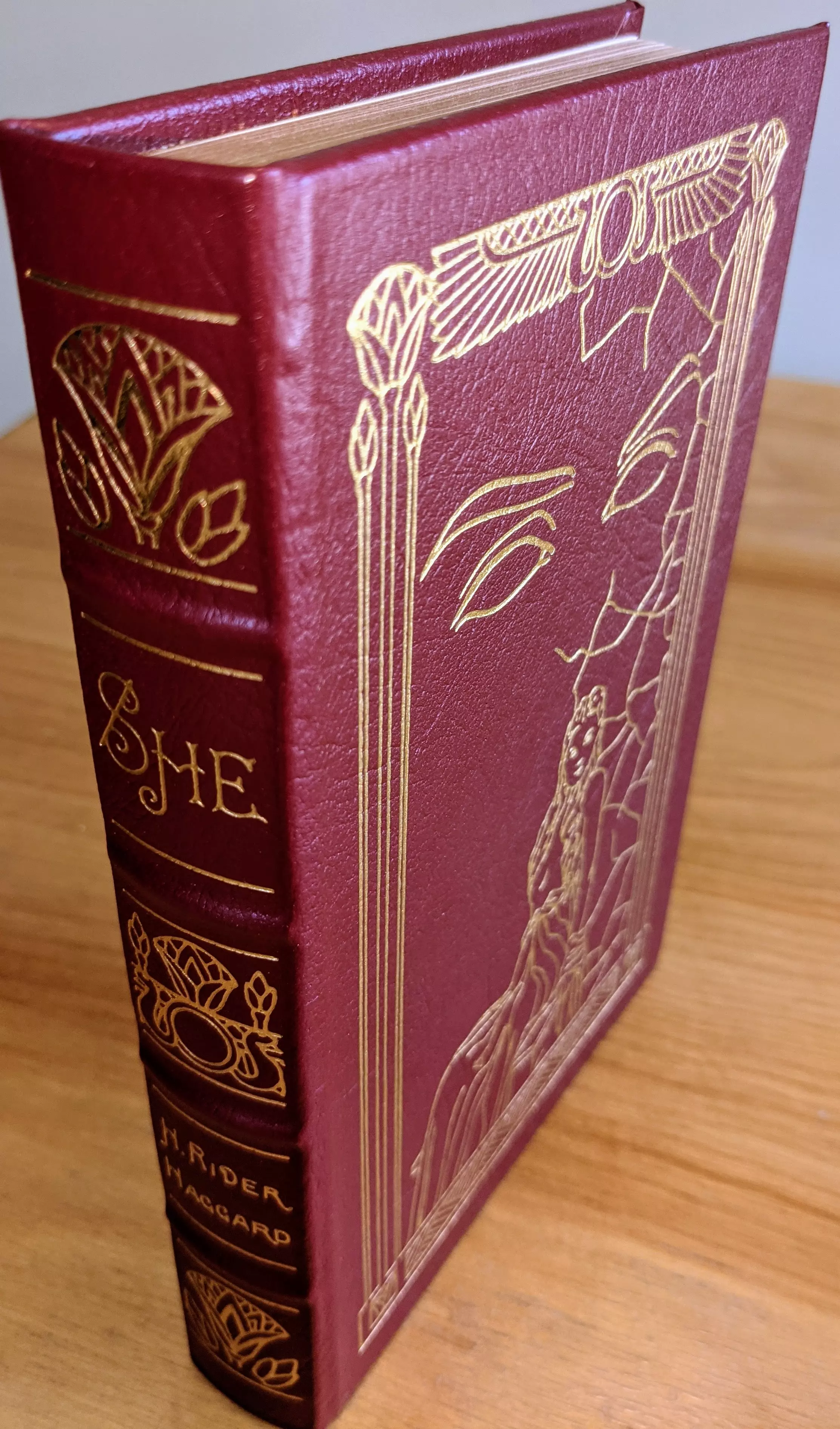 Stunning Red Leather Bound hardback book with hubbed spine, cover artwork in 22kt gold, printed on archival paper with gold gilded edges, smyth sewing & concealed muslin joints
	  - original artwork by Frank Kelly Freas