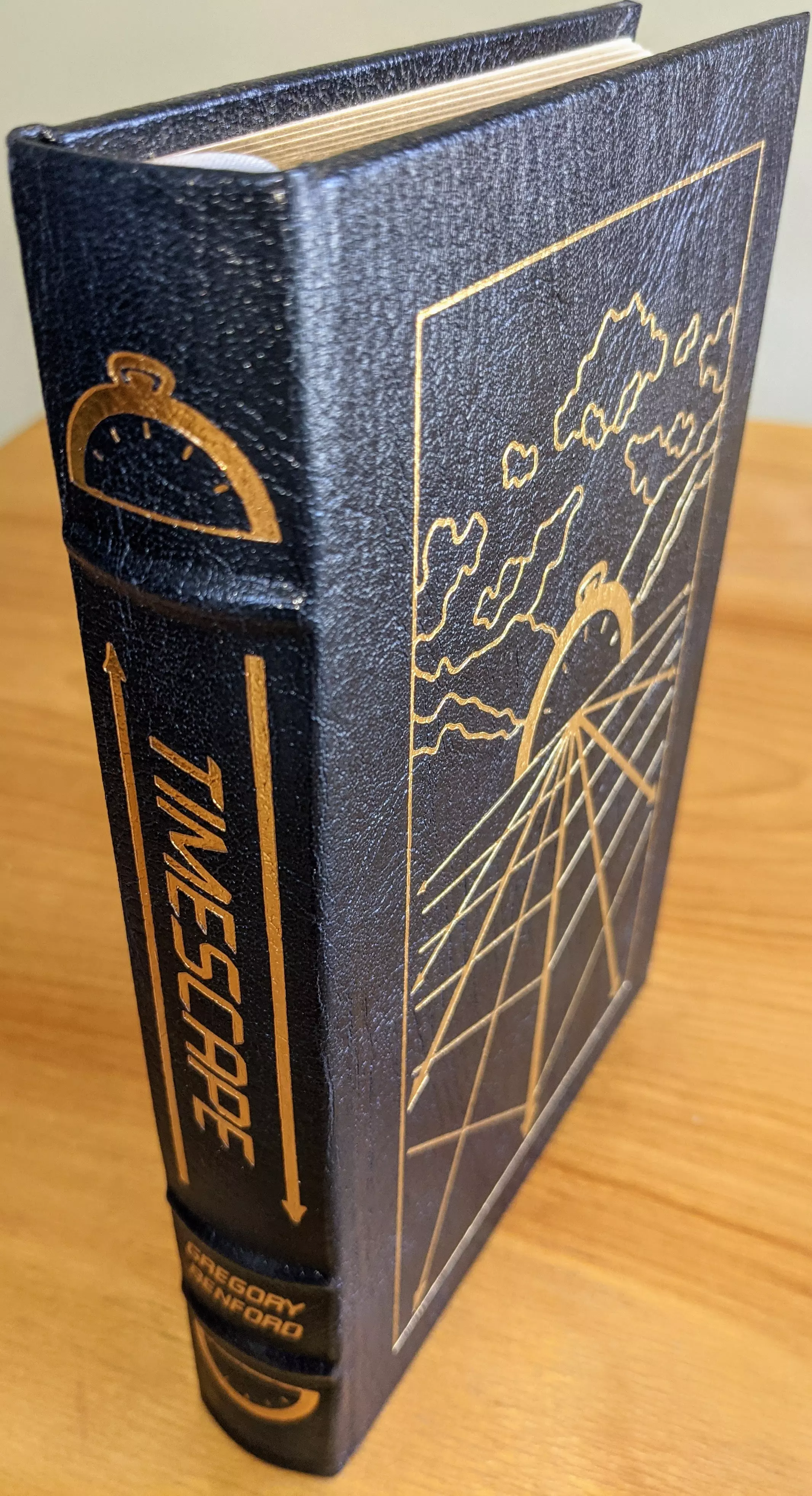 Stunning Navy Blue Leather Bound hardback book with hubbed spine, cover artwork in 22kt gold, printed on archival paper with gold gilded edges, smyth sewing & concealed muslin joints
	  - original artwork by Bob Eggleton