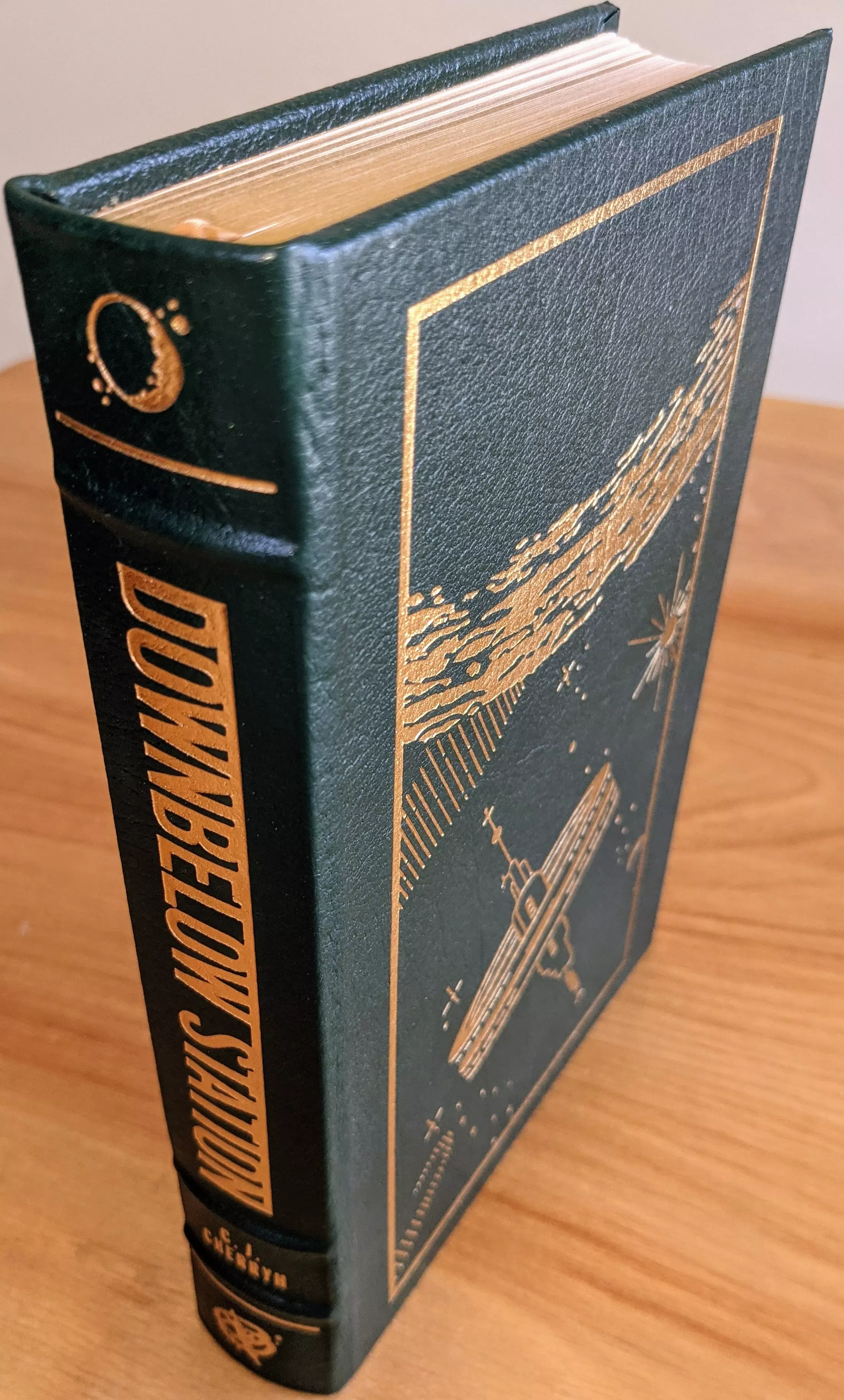 Stunning Green Leather Bound hardback book with hubbed spine, cover artwork in 22kt gold, printed on archival paper with gold gilded edges, smyth sewing & concealed muslin joints
	  - original artwork by Vincent DiFate