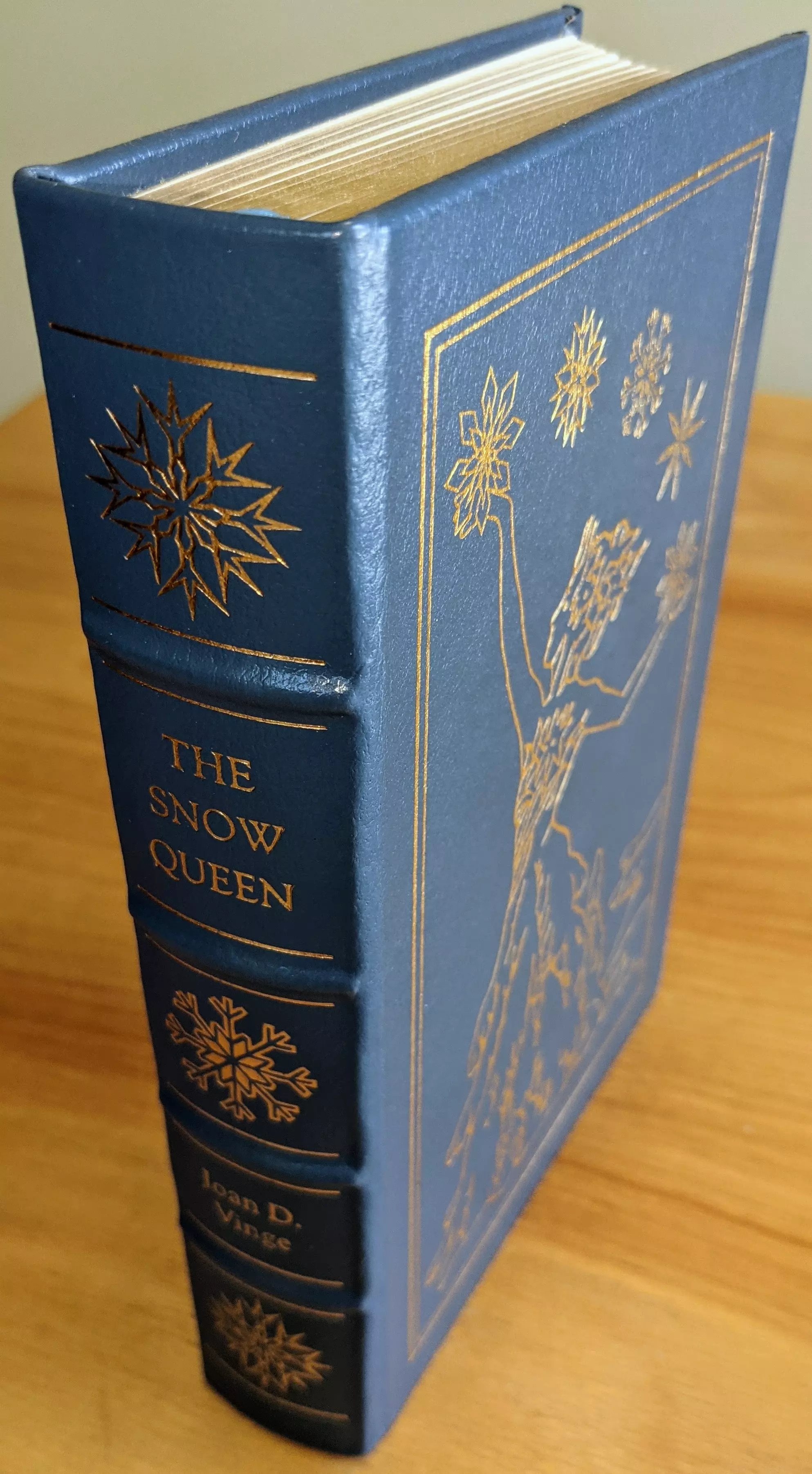 Stunning Blue Leather Bound hardback book with hubbed spine, cover artwork in 22kt gold, printed on archival paper with gold gilded edges, smyth sewing & concealed muslin joints
	  - original artwork by Pat Morrissey