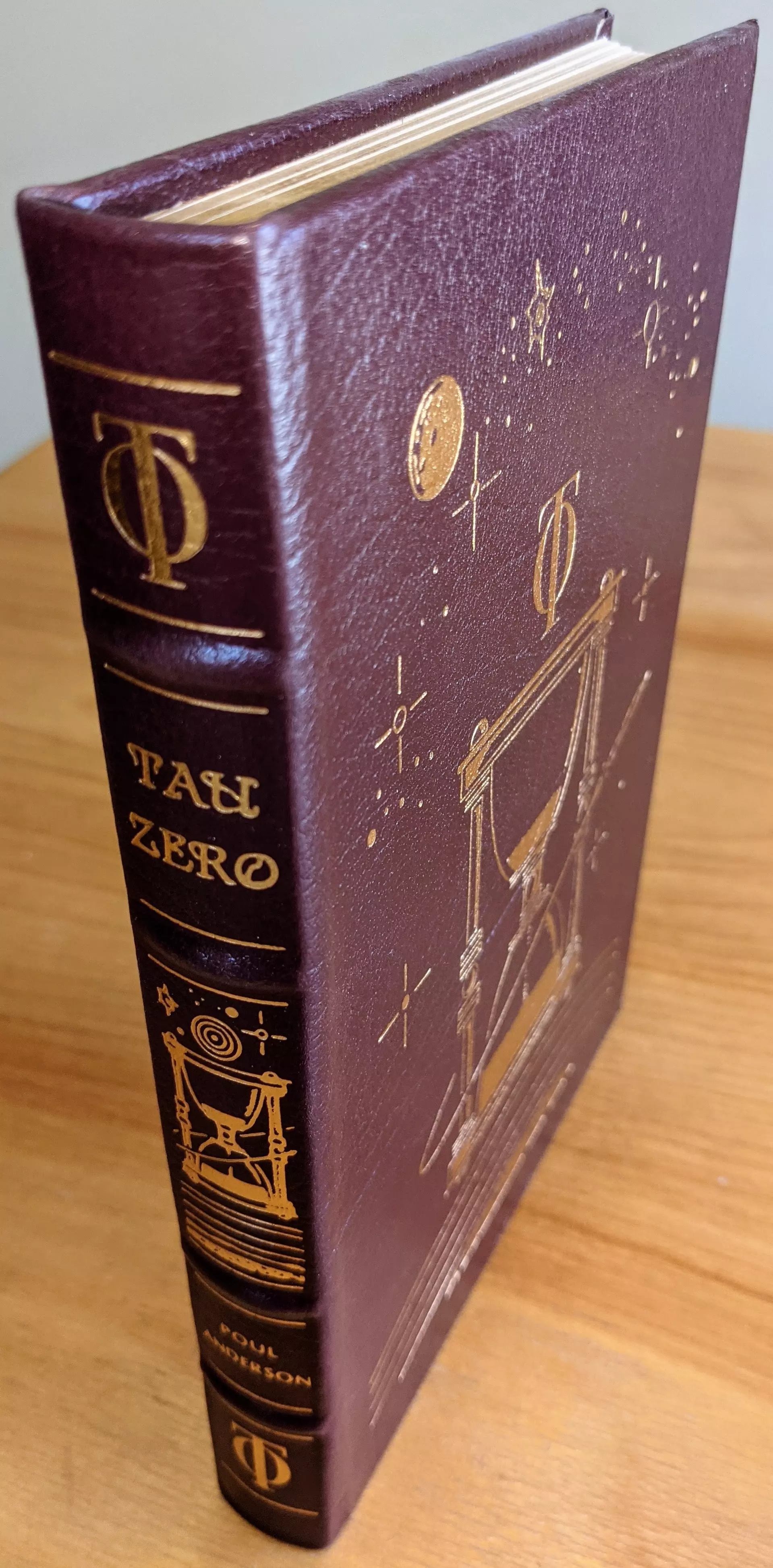 Stunning Wine Color Leather Bound hardback book with hubbed spine, cover artwork in 22kt gold, printed on archival paper with gold gilded edges, smyth sewing & concealed muslin joints
	  - original artwork by Vincent DiFate 