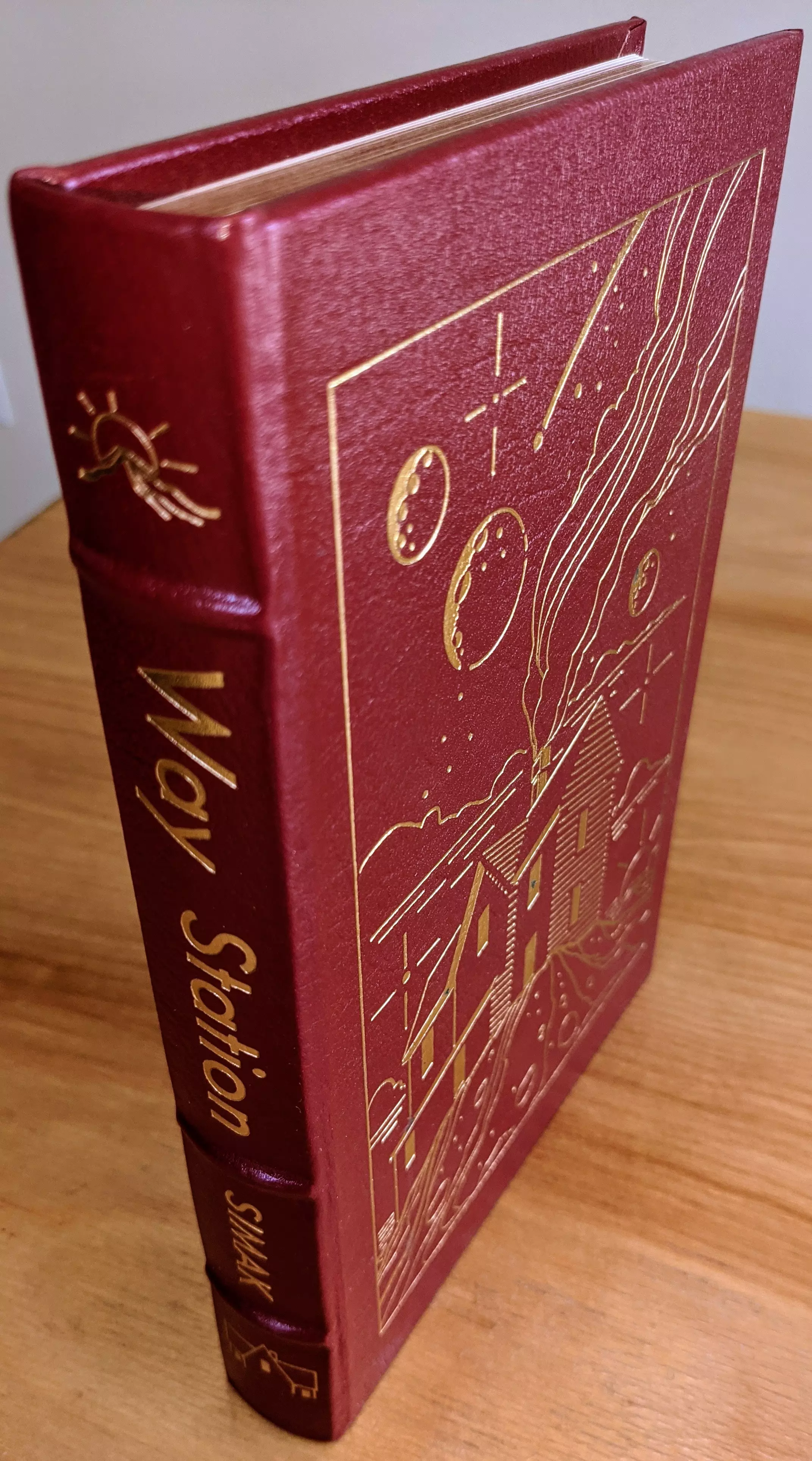 Stunning Red Leather Bound hardback book with hubbed spine, cover artwork in 22kt gold, printed on archival paper with gold gilded edges, smyth sewing & concealed muslin joints
	  - original artwork by Vincent DiFate