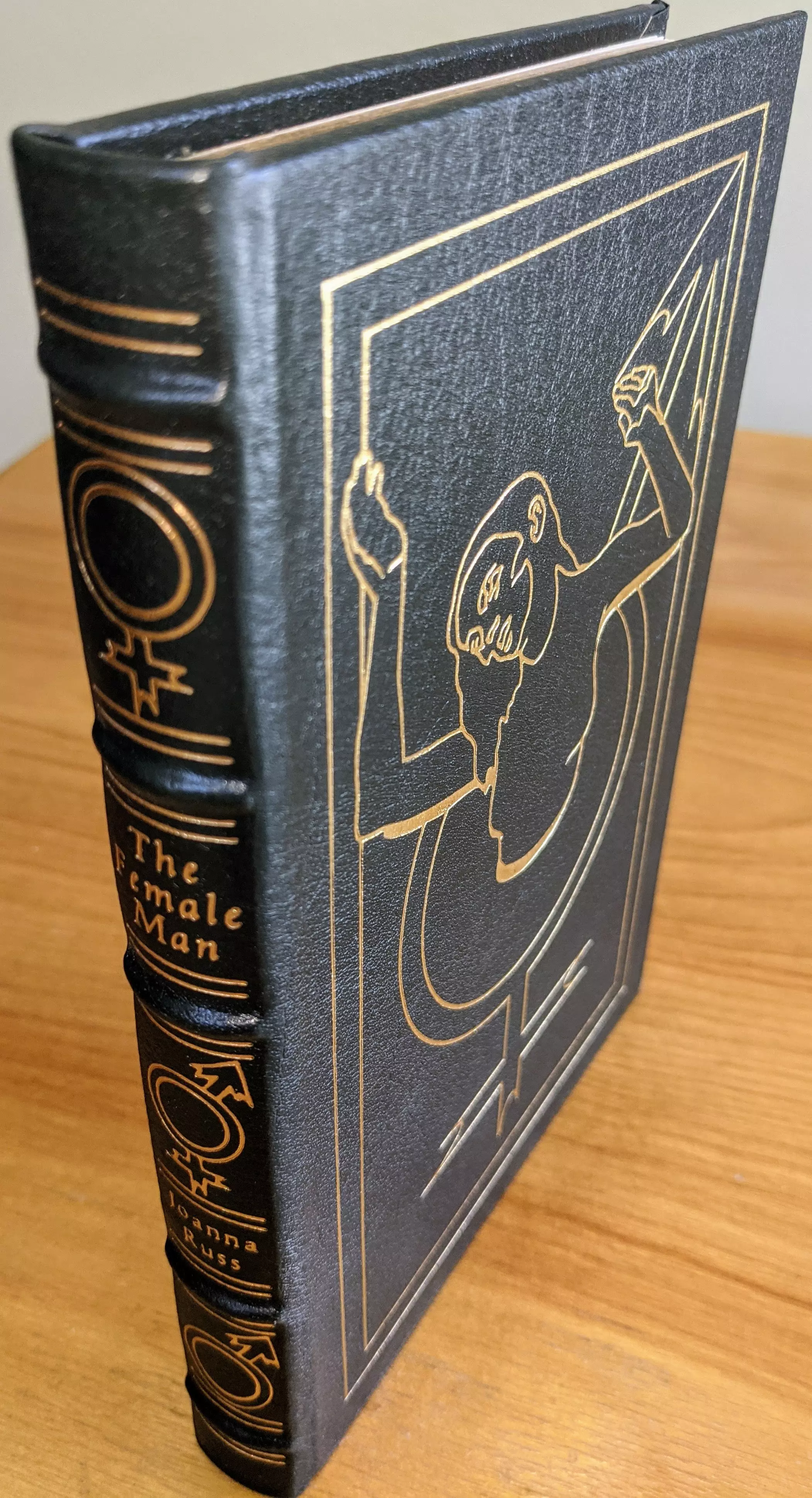 Stunning Green Leather Bound hardback book with hubbed spine, cover artwork in 22kt gold, printed on archival paper with gold gilded edges, smyth sewing & concealed muslin joints
	  - original artwork by Clee Richeson 