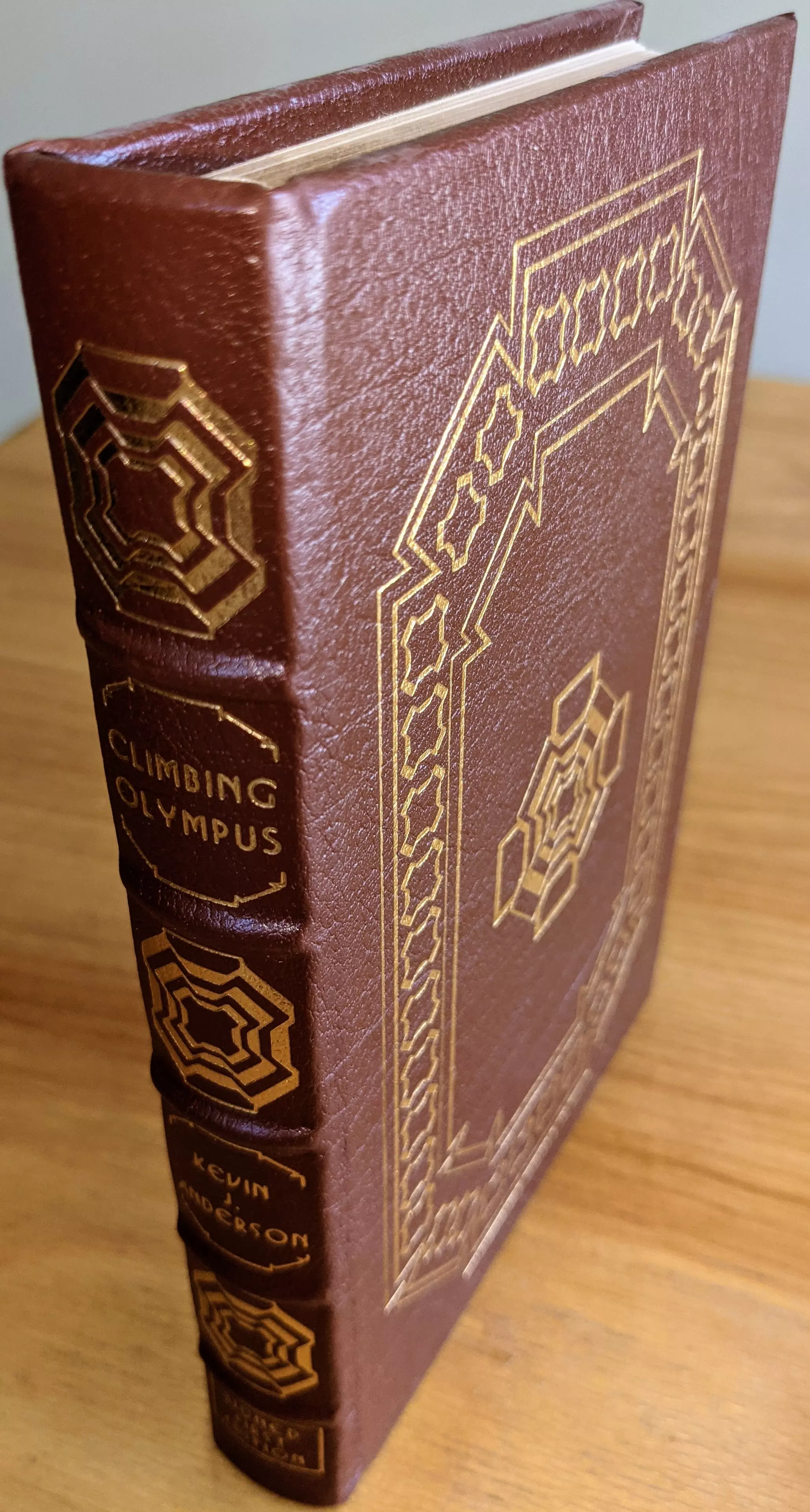 Stunning Brown Leather Bound hardback book with hubbed spine, cover artwork in 22kt gold, printed on archival paper with gold gilded edges, smyth sewing & concealed muslin joints
	  - original artwork by Jeff Fisher