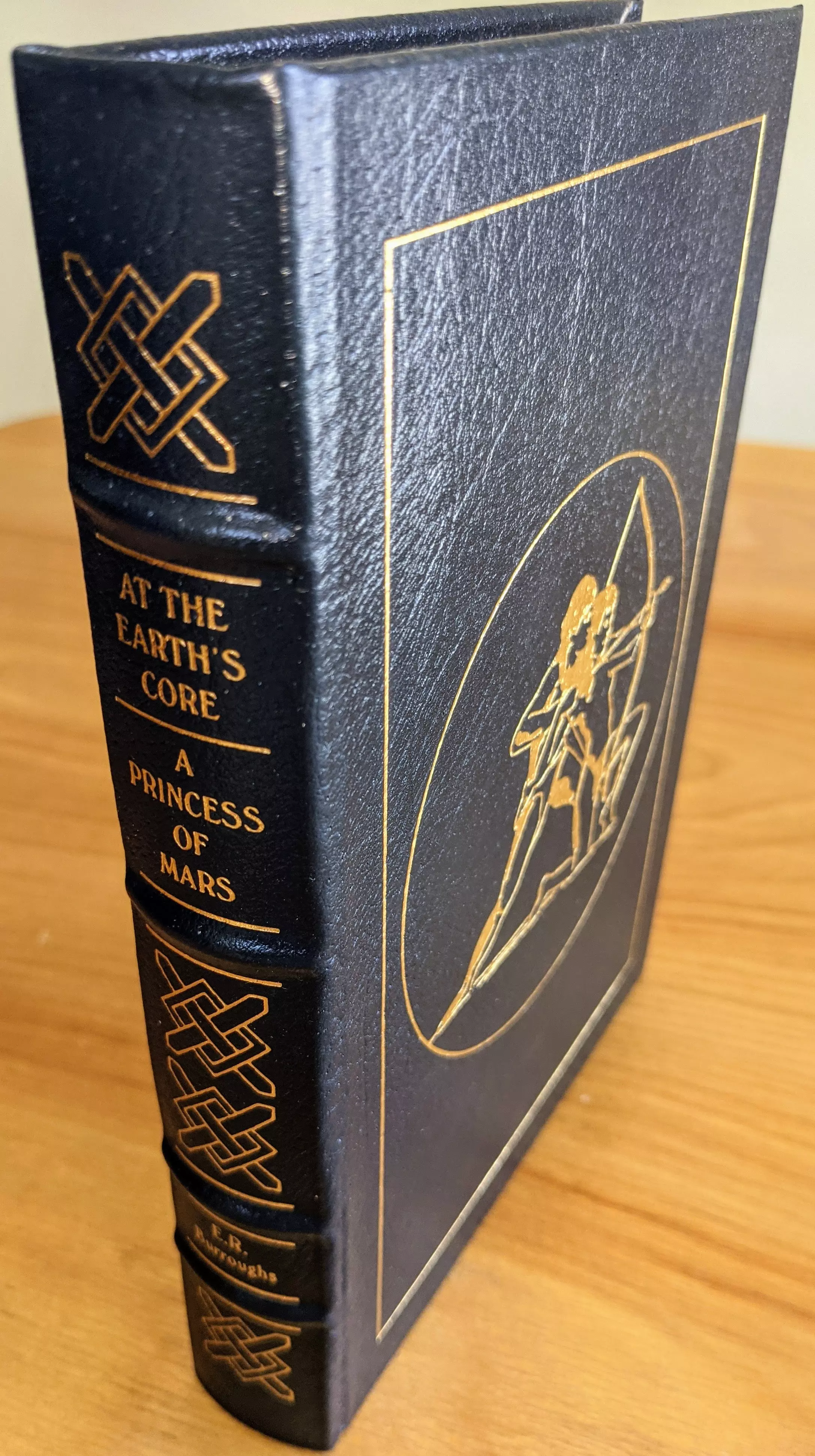 Stunning Navy Blue Leather Bound hardback book with hubbed spine, cover artwork in 22kt gold, printed on archival paper with gold gilded edges, smyth sewing & concealed muslin joints
	  - original artwork by Ron Miller